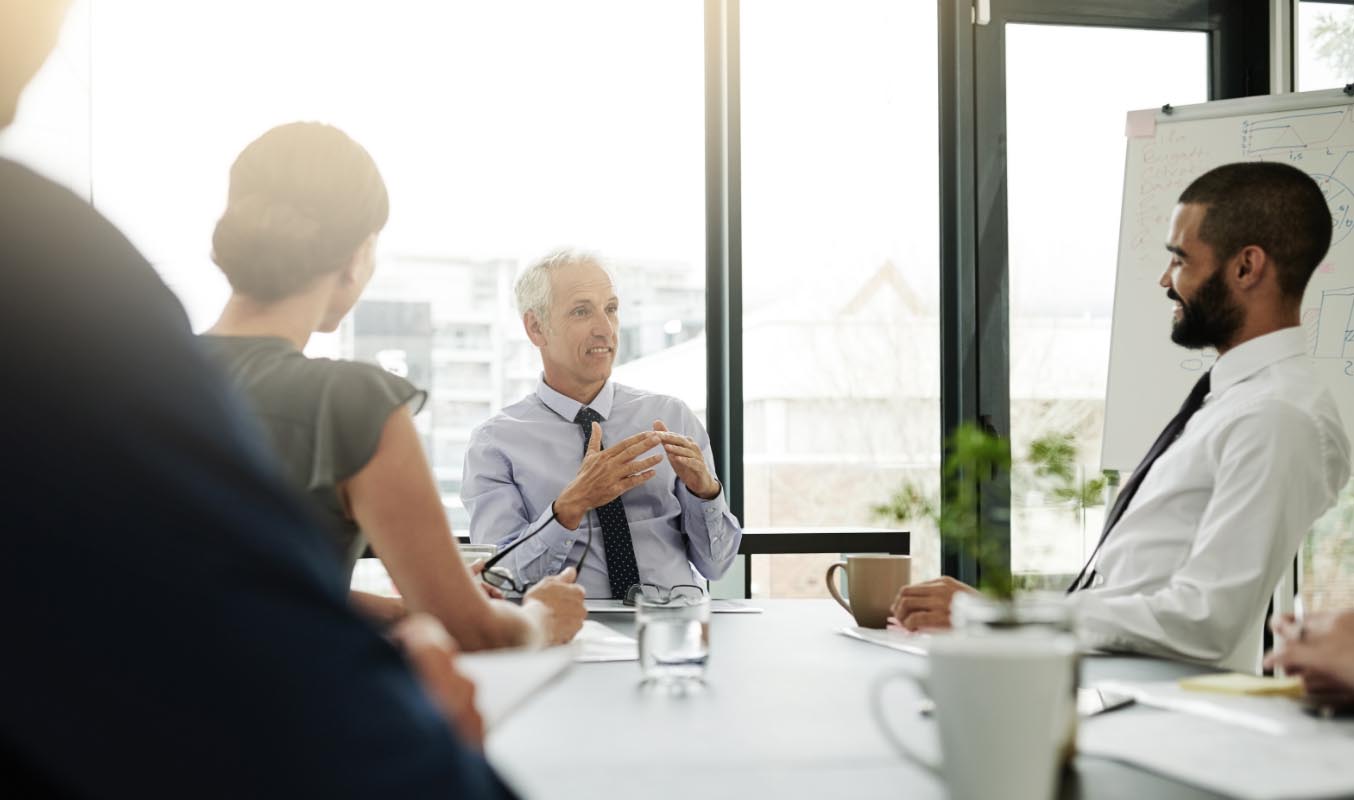 Board members in discussion