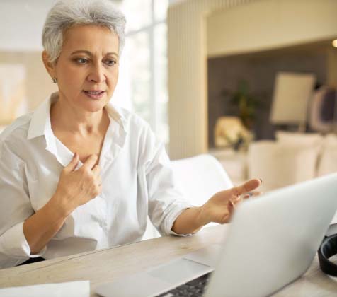 Board Director presenting an agenda in a virtual meeting