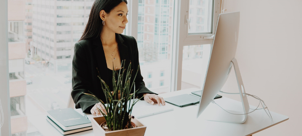 woman in front of computer