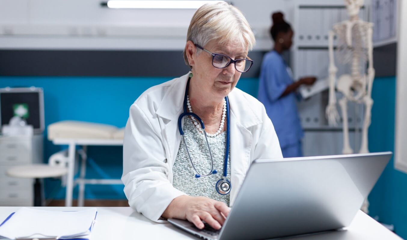 Healthcare professional checking for patient information online